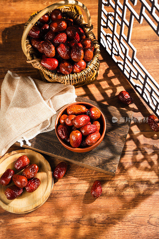 Dates in basket on wooden table